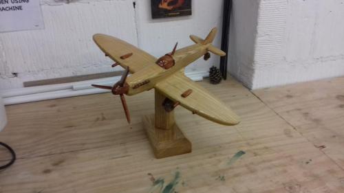 Wooden Spitfire on stand